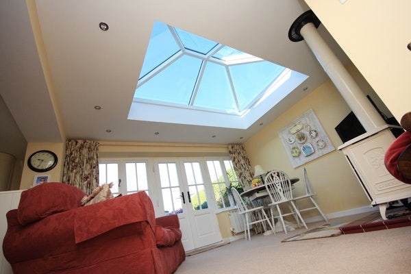 white framed lantern installed in roof